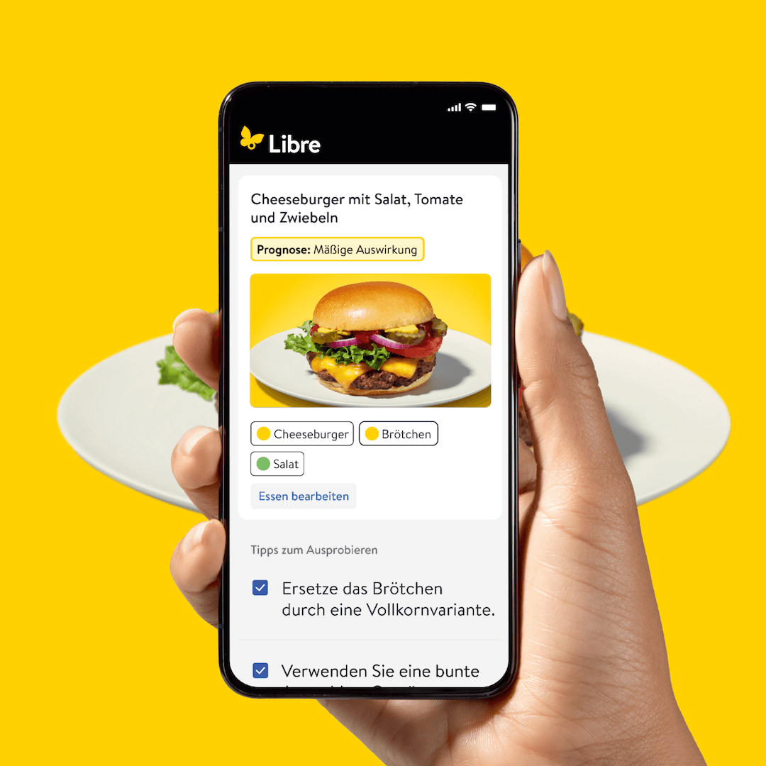 Libre Assist: Smartphone scannt einen Cheeseburger und zeigt vorhergesagte Auswirkung auf den Glukosespiegel